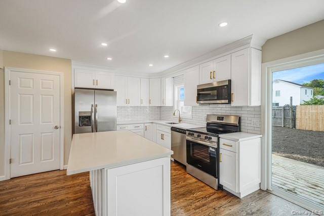 Casa de 4 Dormitorios en Venta en North Babylon, Nueva York, EE. UU. - 7